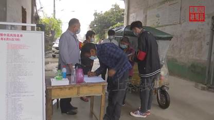 说明: 上蔡县大学生志愿者:在疫情防控一线尽显担当