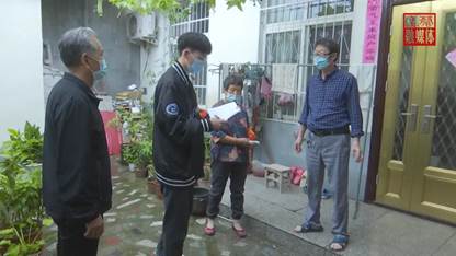 说明: 上蔡县大学生志愿者:在疫情防控一线尽显担当